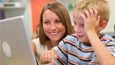 young boy with laptop