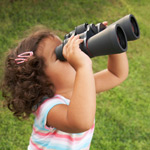 young girl binoculars