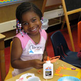 young girl with art project