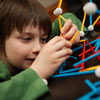 kid engaged with science