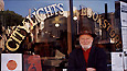 Lawrence Ferlinghetti outside City Lights