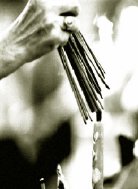 picture of hand holding sticks